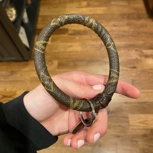 REAL Louis V Wrist key ring